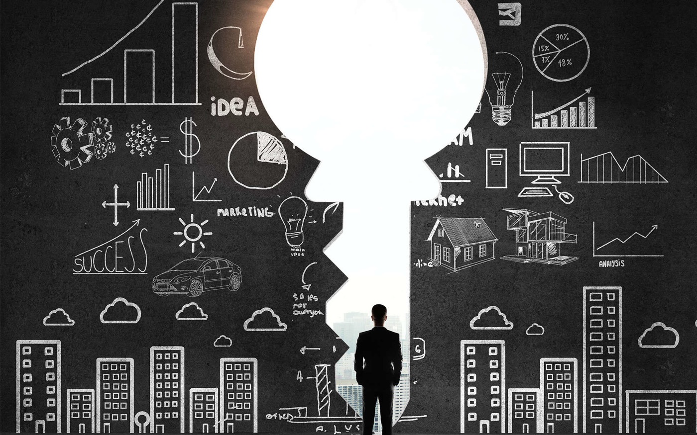 Chalkboard with marketing and success sketches